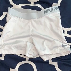White nike pros
